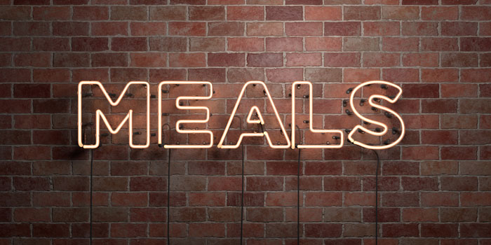 neon sign featuring the word meals