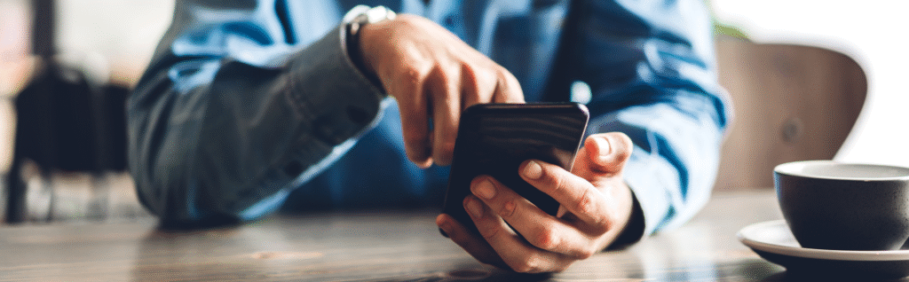 Person selecting something on his phone screen